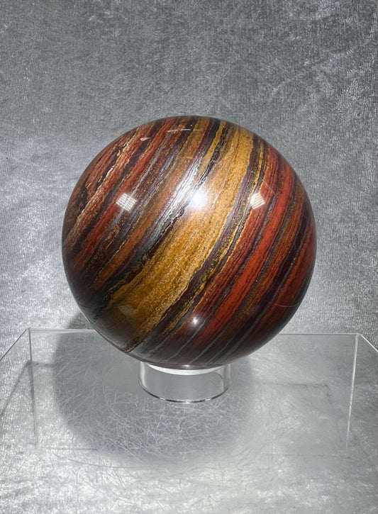 Very Rare Tiger Iron Crystal Sphere. 79mm. High Quality Display Crystal. Amazing Colors And Hematite Flash
