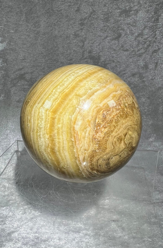 Large Banded Amber Calcite Sphere. 78mm. Incredible Banding And Patterns. Very Nice Display Crystal.