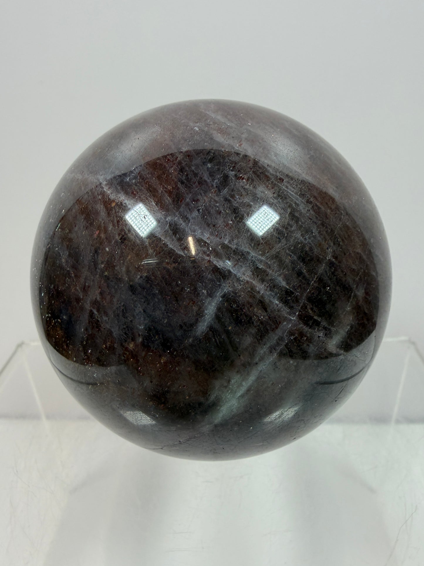 Bloodshot Iolite Sphere. 64mm. Stunning Galaxy Iolite Sunstone Display Sphere. Amazing And Colorful Flash!