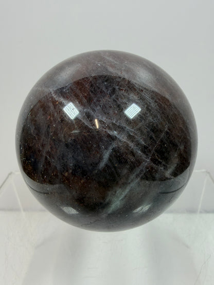 Bloodshot Iolite Sphere. 64mm. Stunning Galaxy Iolite Sunstone Display Sphere. Amazing And Colorful Flash!
