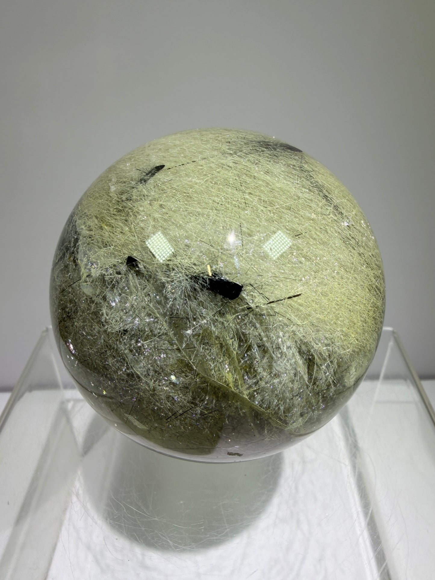 Black Tourmaline And Rabbit Hair Quartz Sphere. 70mm. Stunning Rabbit Hair Rutile With Black Tourmaline Inclusions. Very Rare Display Sphere.