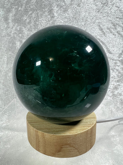 Green Fluorite Sphere. 76mm. Rare Emerald Green Fluorite. Comes With A White Light Stand. Gorgeous High Quality Crystal