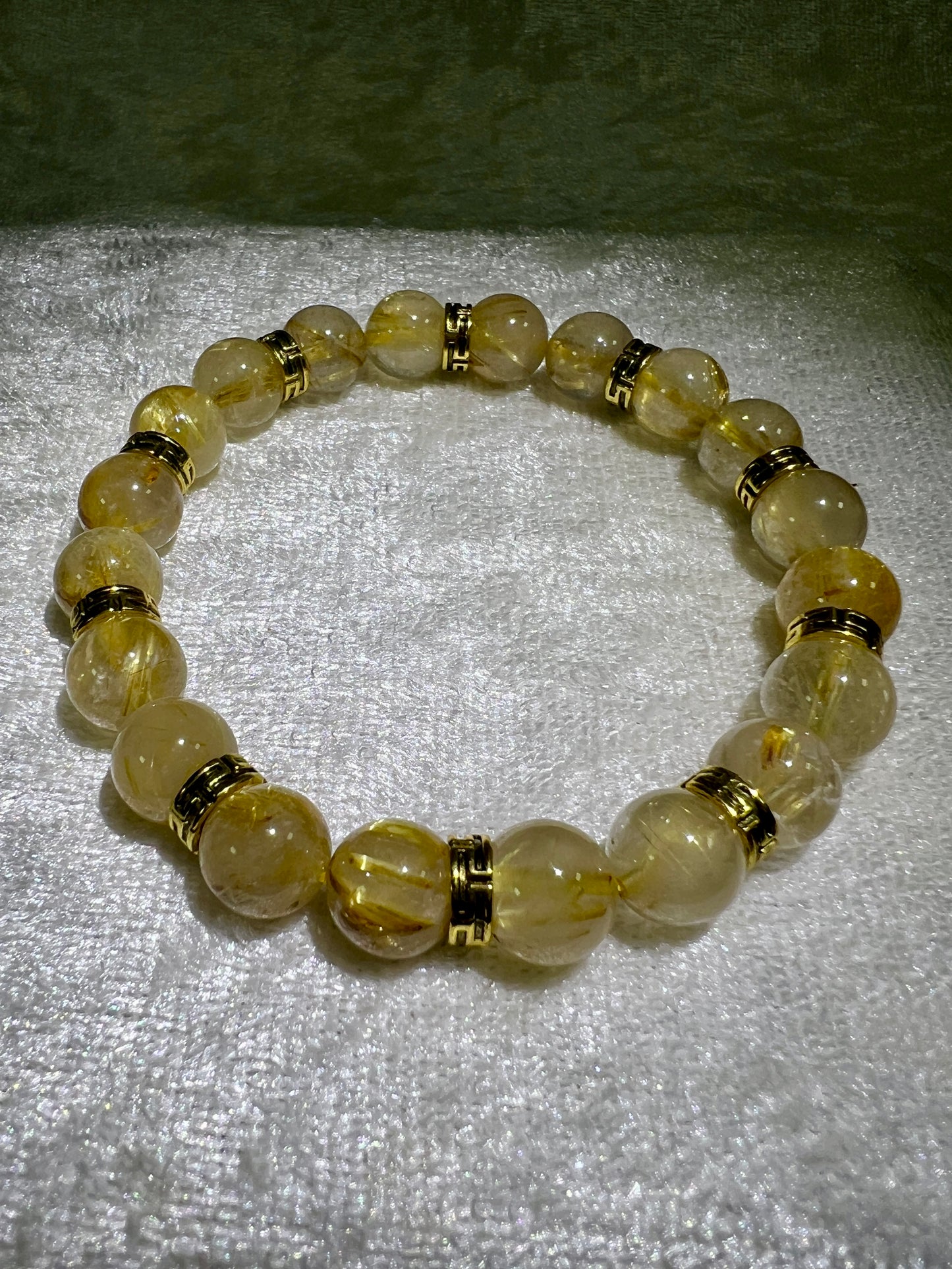 Rutile Quartz Crystal Bead Bracelet. Beautiful Rutilated Quartz Bracelet. 9.5mm. Amazing Golden Spacers.