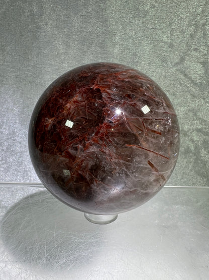Tourmalinated Quartz Sphere. 66mm. Gorgeous Red Tourmaline Inclusions. Unique And Rare Display Sphere.