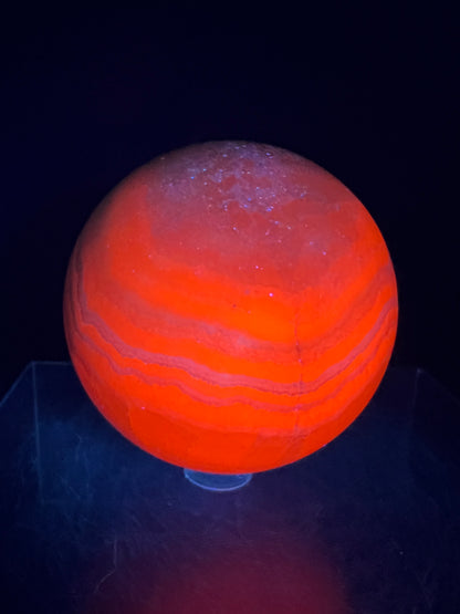 Mangano Calcite Sphere. 72mm. Very Intense Orange UV Reaction. Large High Quality Display Crystal From Peru.