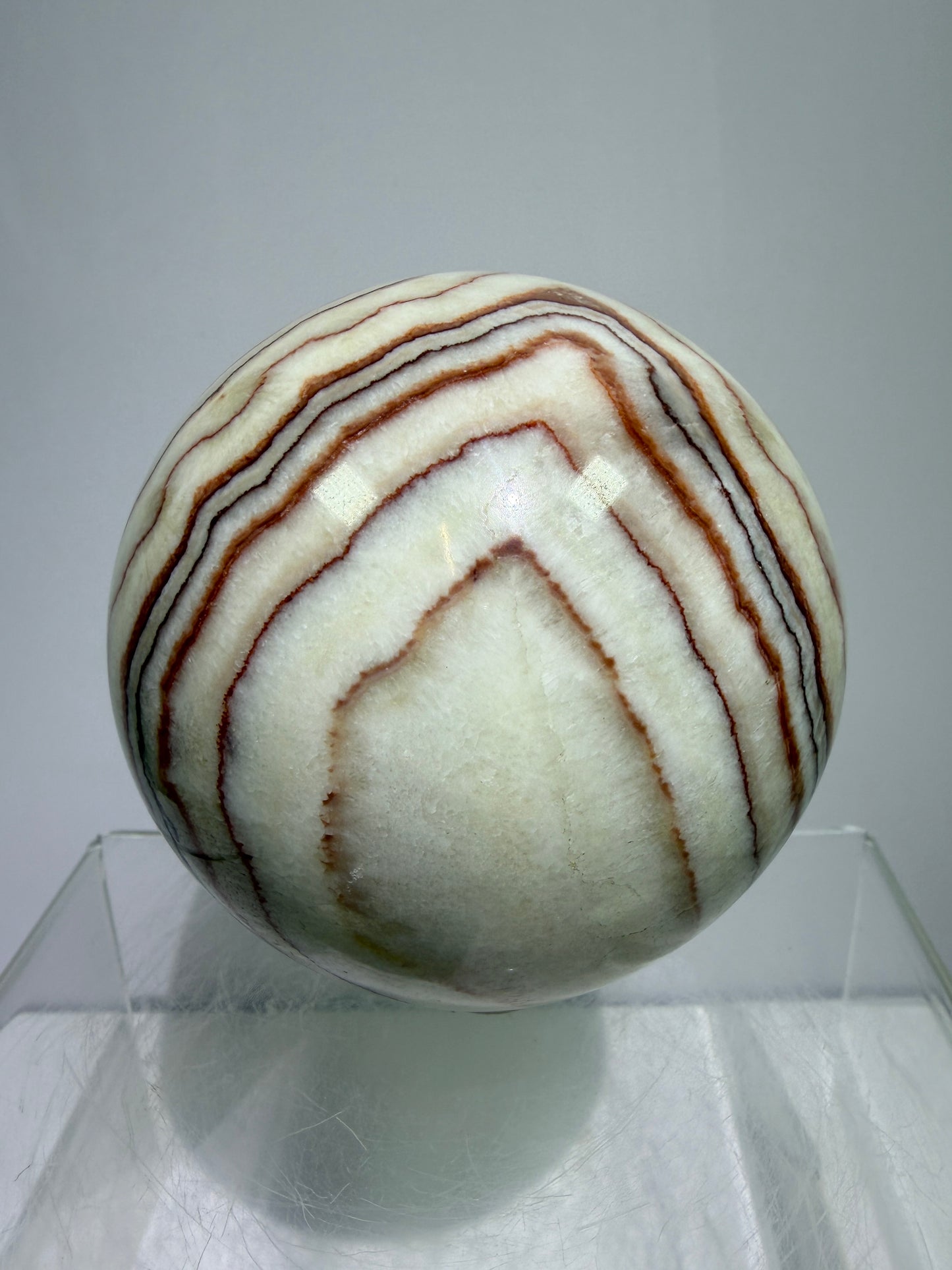 Pork Stone Crystal Sphere. 77mm. Red Banded Calcite Display Sphere. High Quality UV Reactive Crystal