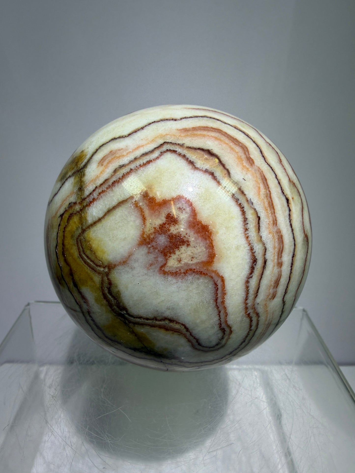 Pork Stone Crystal Sphere. 77mm. Red Banded Calcite Display Sphere. High Quality UV Reactive Crystal