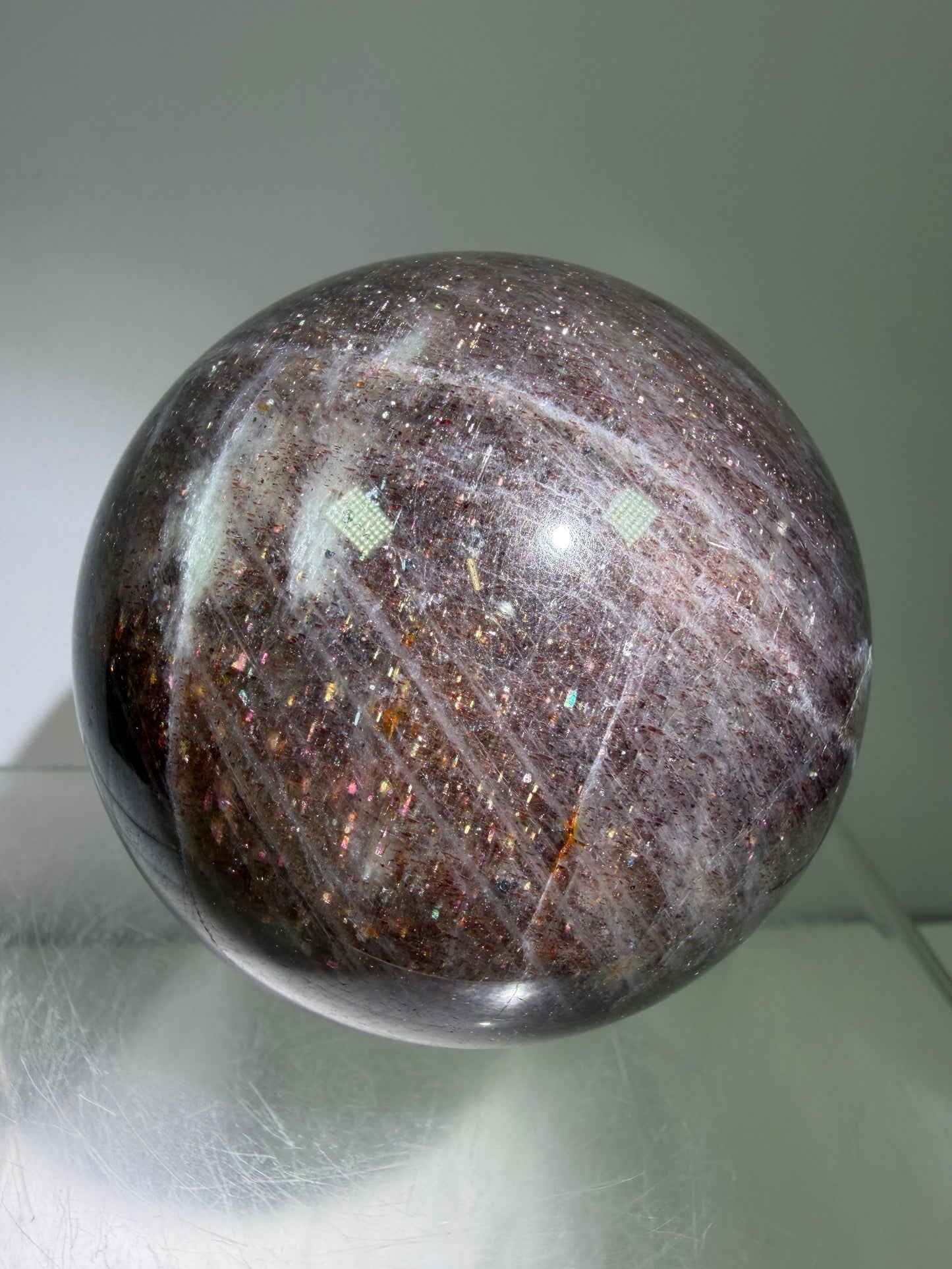 Bloodshot Iolite Sphere. 64mm. Stunning Galaxy Iolite Sunstone Display Sphere. Amazing And Colorful Flash!