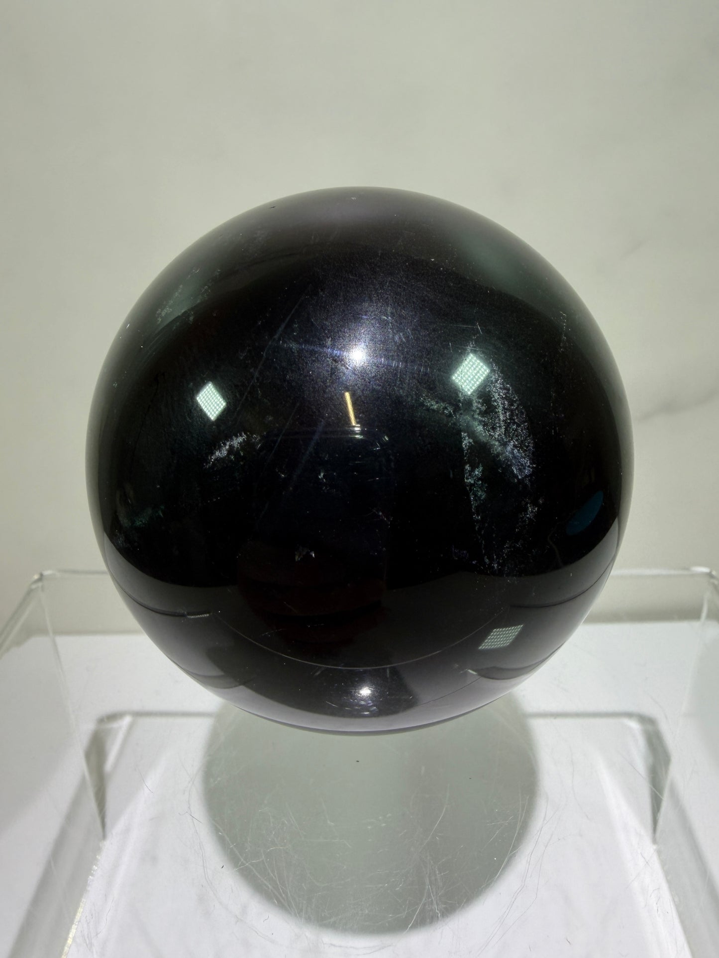 Black Rose Fluorite Sphere. 63mm. Incredible UV Reactive Crystal With Rainbows. Bright Red And Purple Reaction. Rare Display Sphere.