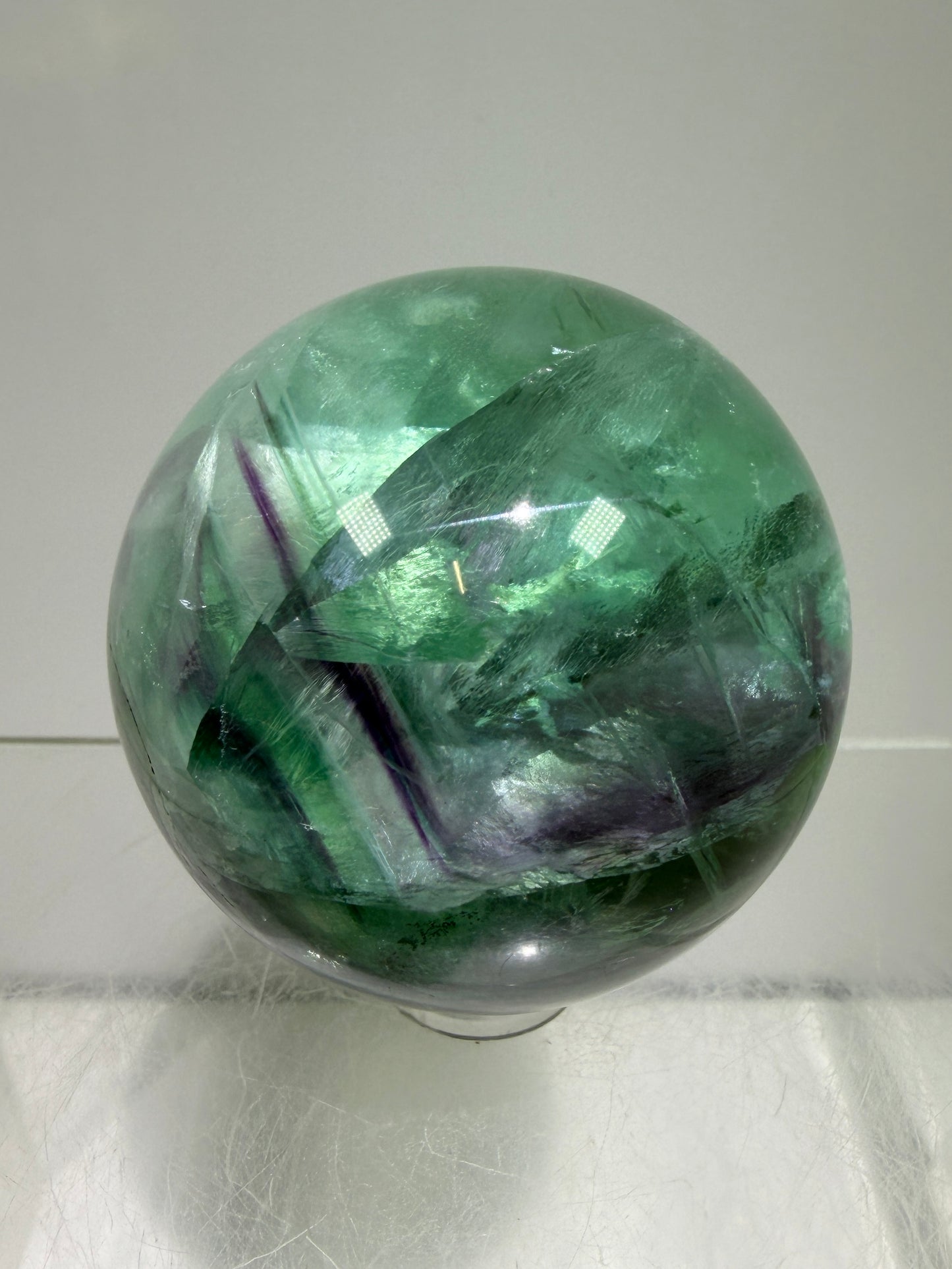 Green And Purple Fluorite Sphere. High Quality Display Sphere With Stunning Rainbows.