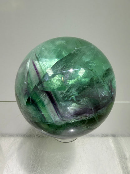 Green And Purple Fluorite Sphere. High Quality Display Sphere With Stunning Rainbows.