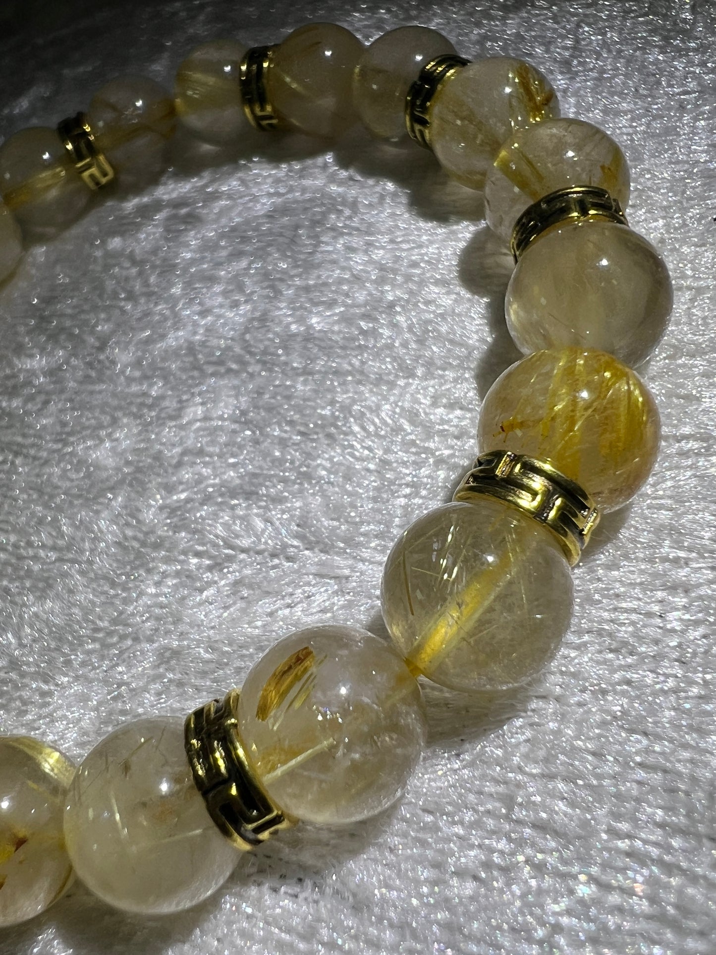 Rutile Quartz Crystal Bead Bracelet. Beautiful Rutilated Quartz Bracelet. 9.5mm. Amazing Golden Spacers.