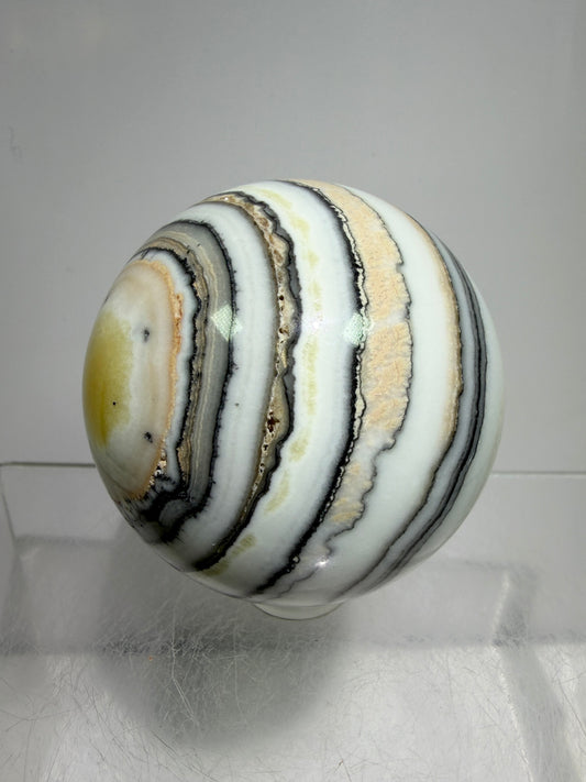 Banded Zebra Calcite Sphere. 53mm. Gorgeous Calcite Display Sphere. Rare Colors With Stunning Patterns