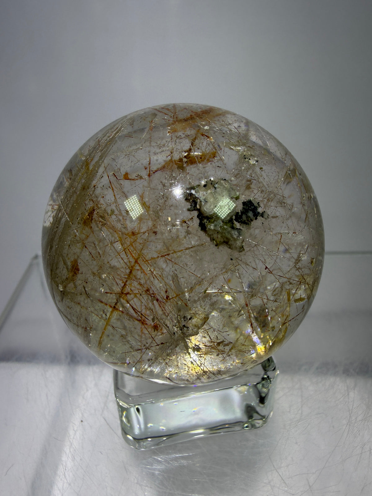 Rutile And Tourmaline Quartz Sphere. 43mm. Incredible Rainbows, With Phantoms And Spots Of Lodolite. Very Rare Display Sphere