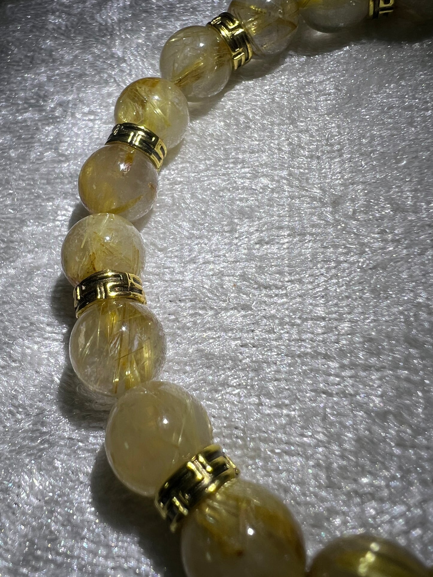 Rutile Quartz Crystal Bead Bracelet. Beautiful Rutilated Quartz Bracelet. 9.5mm. Amazing Golden Spacers.