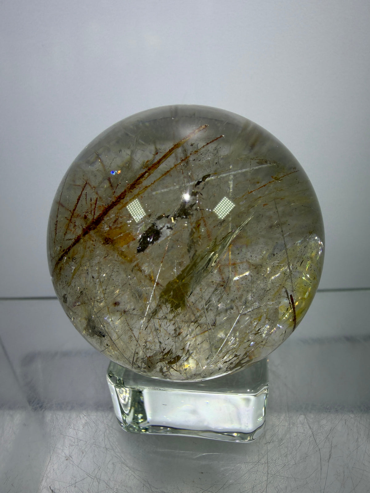 Rutile And Tourmaline Quartz Sphere. 43mm. Incredible Rainbows, With Phantoms And Spots Of Lodolite. Very Rare Display Sphere
