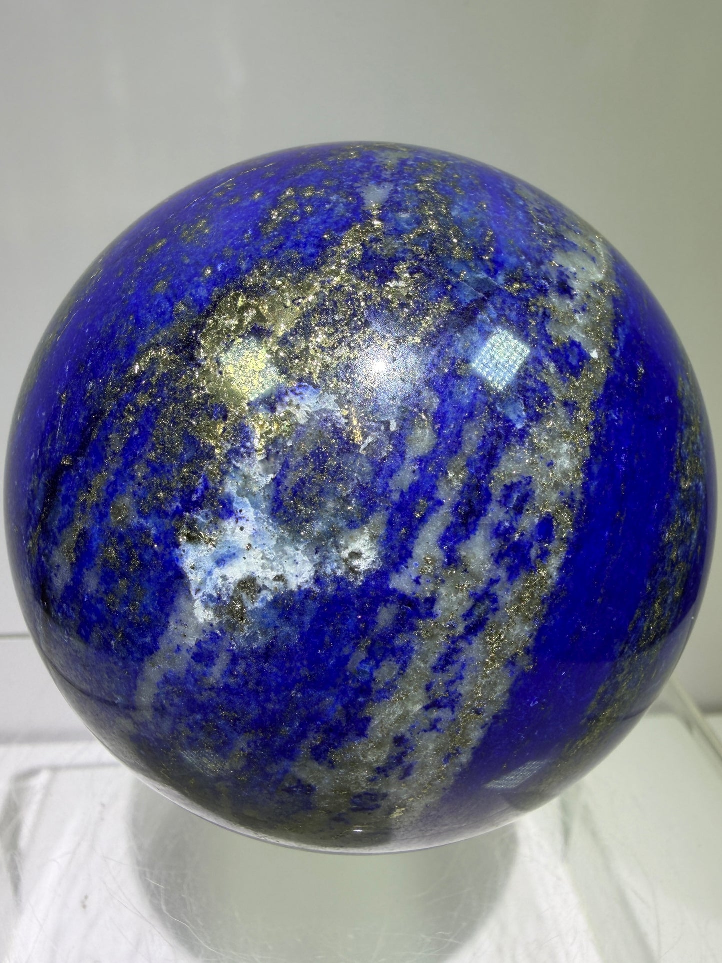 Lapis Lazuli Crystal Sphere. 74mm. Very High Quality Sphere. Stunning Shades Of Bright Blue With Gorgeous Pyrite Inclusions.