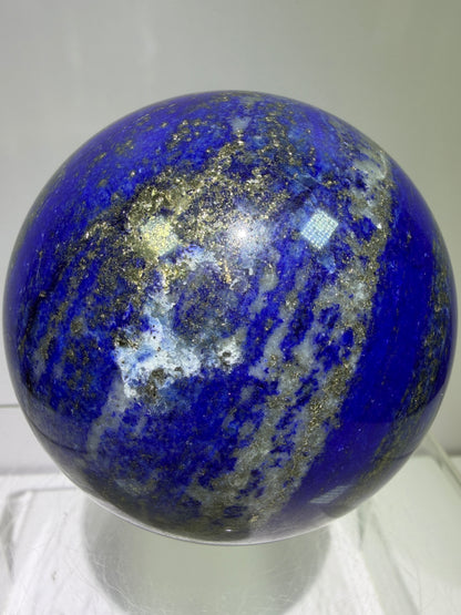 Lapis Lazuli Crystal Sphere. 74mm. Very High Quality Sphere. Stunning Shades Of Bright Blue With Gorgeous Pyrite Inclusions.