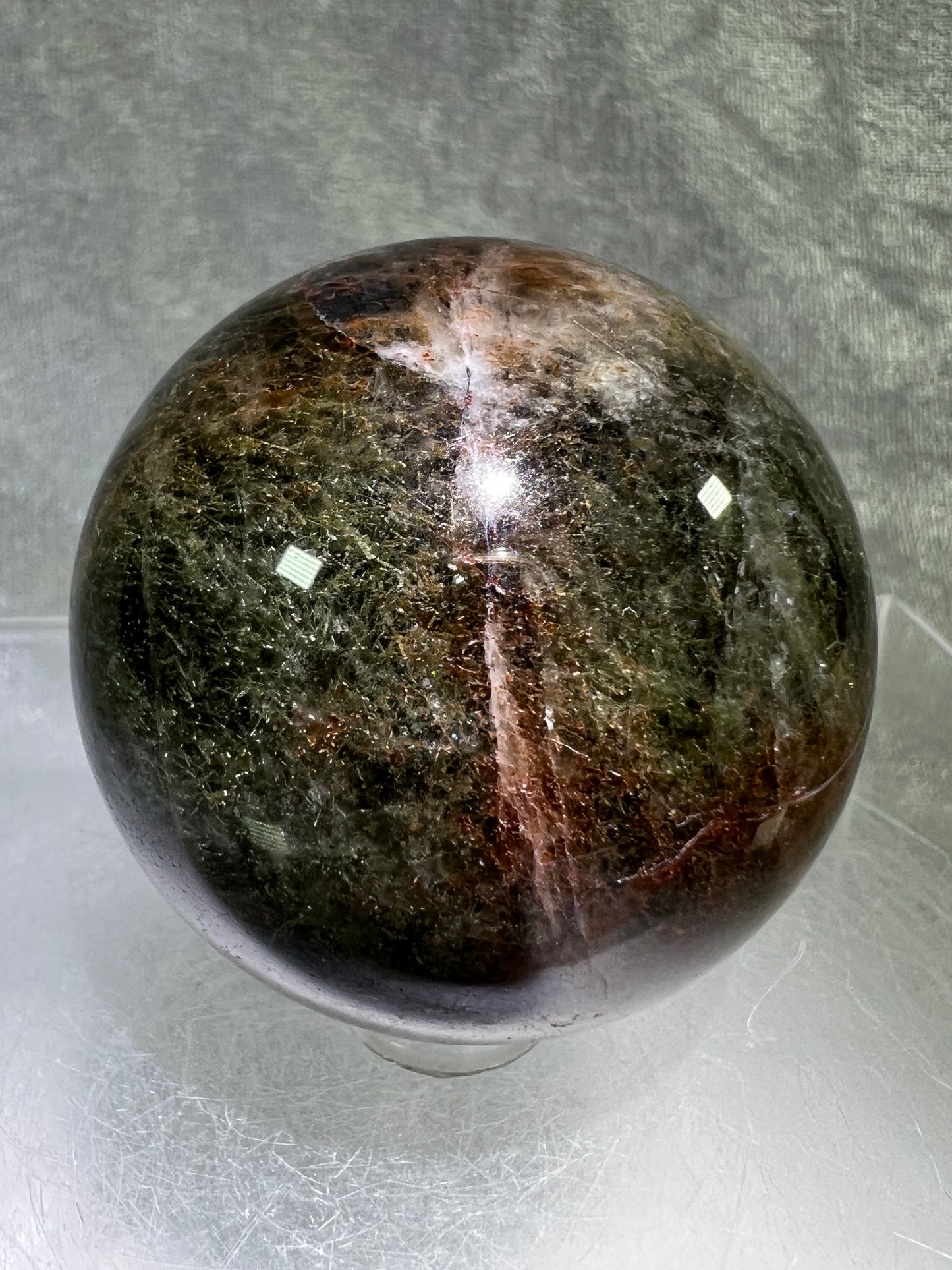 Tourmalinated Quartz Sphere. 52mm. Gorgeous Red And Green Tourmaline Inclusions. Rare And Unique Display Sphere.