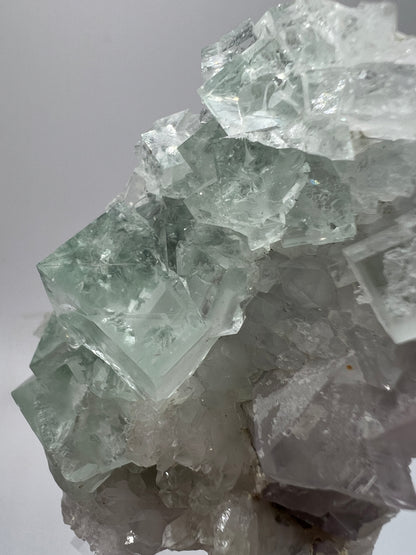 Fluorite And Quartz Mineral Specimen. Stunning Light Green Fluorite Cubes On A Quartz Matrix.