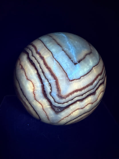 Pork Stone Crystal Sphere. 77mm. Red Banded Calcite Display Sphere. High Quality UV Reactive Crystal