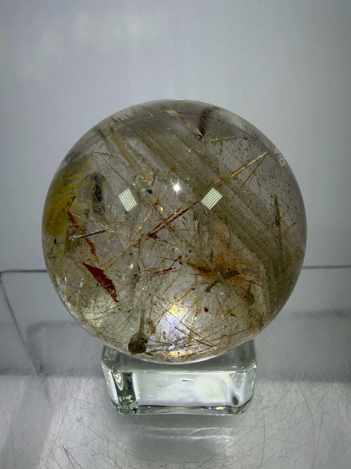 Rutile And Tourmaline Quartz Sphere. 43mm. Incredible Rainbows, With Phantoms And Spots Of Lodolite. Very Rare Display Sphere