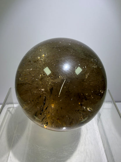Rutile Quartz Sphere. 70mm. Large Smoky Quartz With Rare Golden Rutile Inclusions. Nice Quality Display