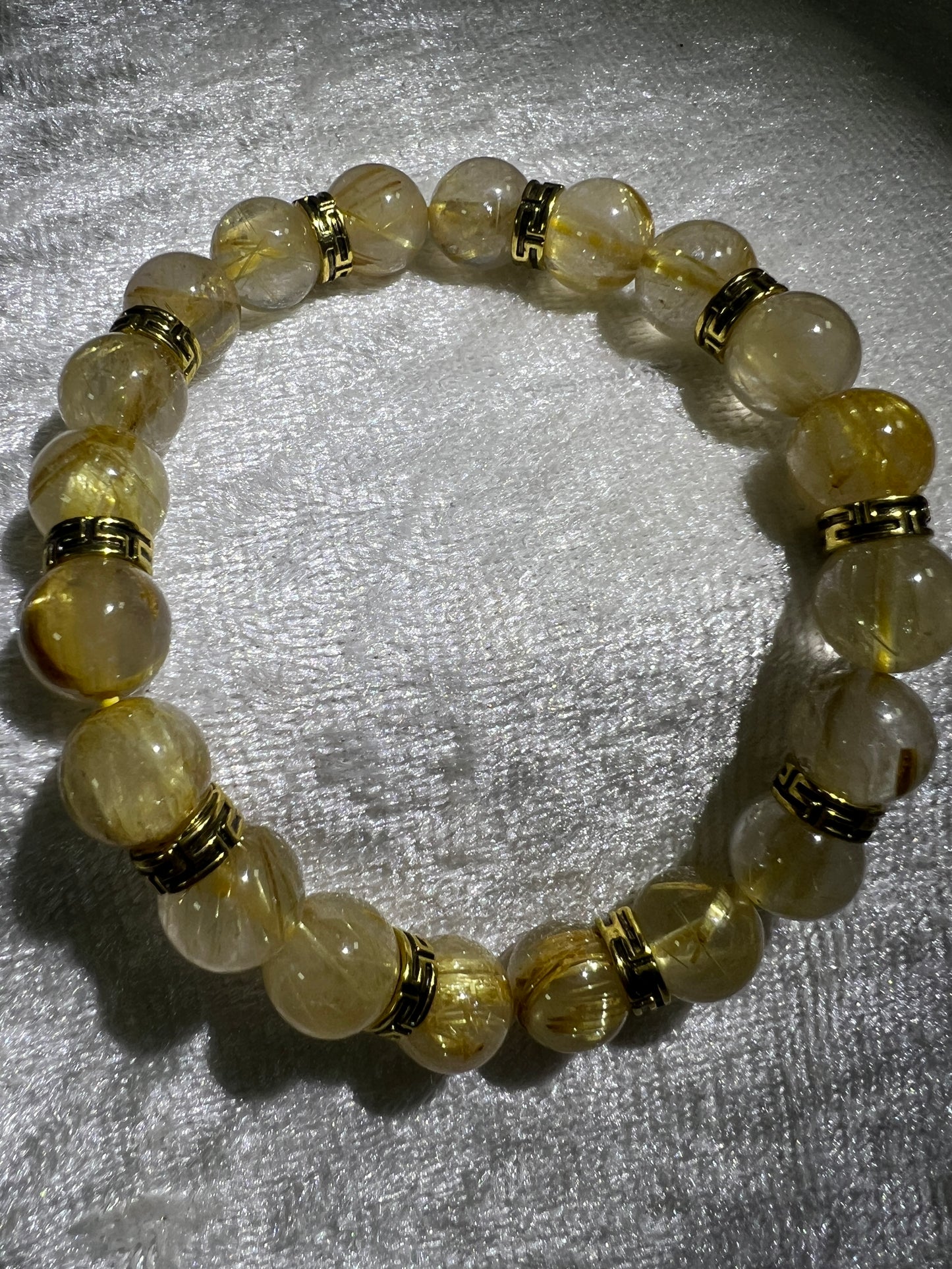 Rutile Quartz Crystal Bead Bracelet. Beautiful Rutilated Quartz Bracelet. 9.5mm. Amazing Golden Spacers.