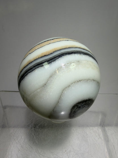 Banded Zebra Calcite Sphere. 53mm. Gorgeous Calcite Display Sphere. Rare Colors With Stunning Patterns