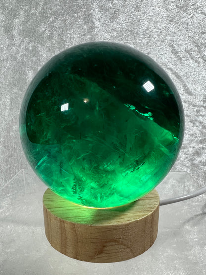 Green Fluorite Sphere. 76mm. Rare Emerald Green Fluorite. Comes With A White Light Stand. Gorgeous High Quality Crystal
