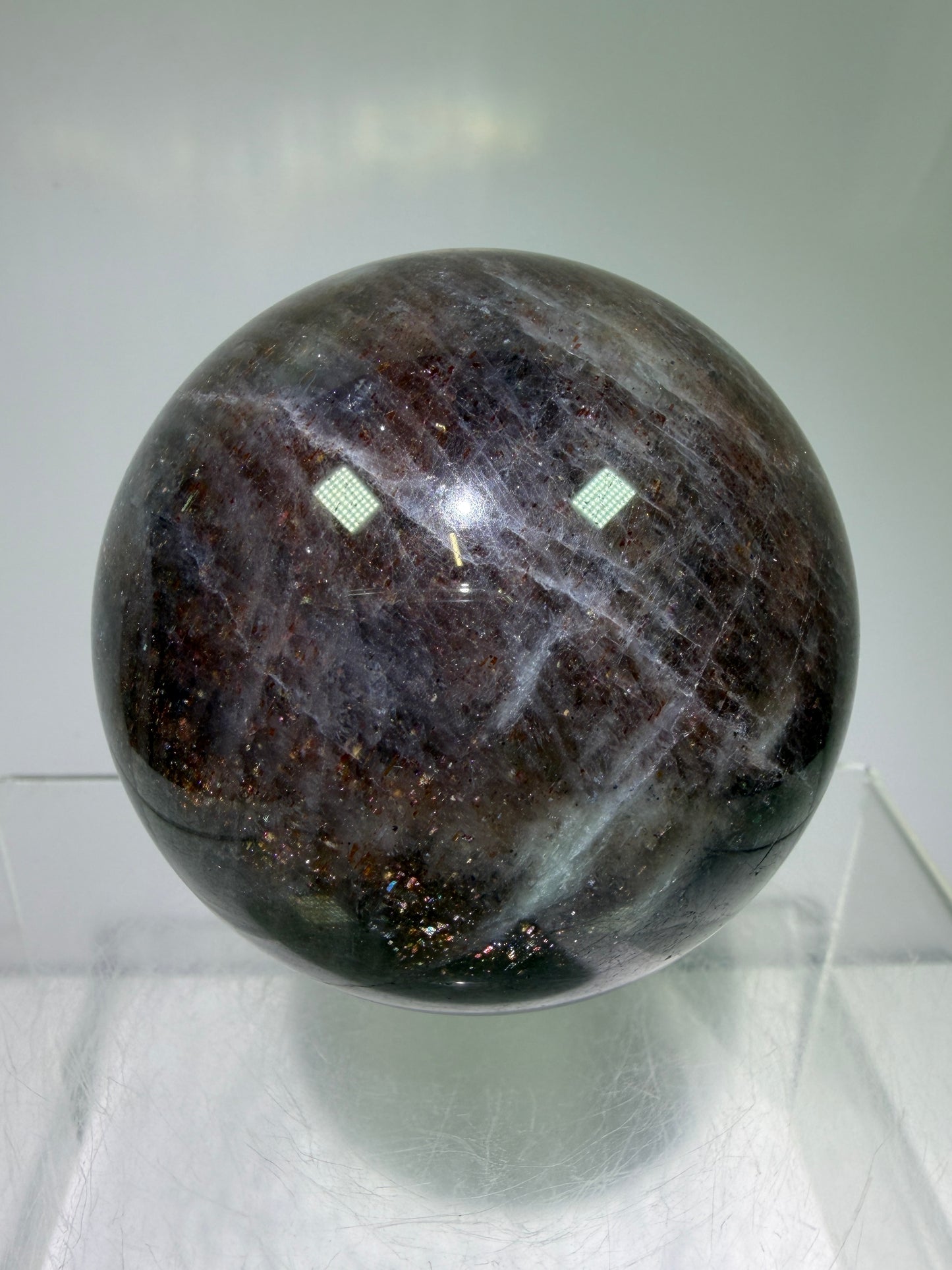 Bloodshot Iolite Sphere. 64mm. Stunning Galaxy Iolite Sunstone Display Sphere. Amazing And Colorful Flash!