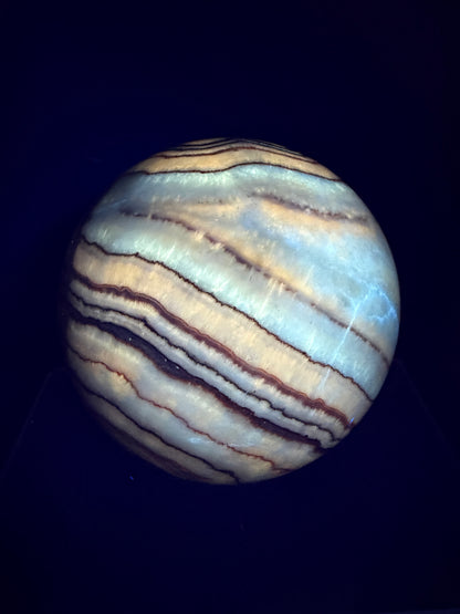 Pork Stone Crystal Sphere. 77mm. Red Banded Calcite Display Sphere. High Quality UV Reactive Crystal