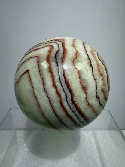 Pork Stone Crystal Sphere. 77mm. Red Banded Calcite Display Sphere. High Quality UV Reactive Crystal