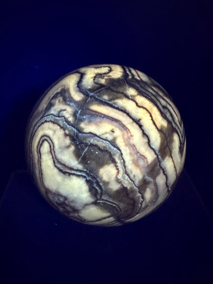 Pork Stone Crystal Sphere. 77mm. Red Banded Calcite Display Sphere. High Quality UV Reactive Crystal