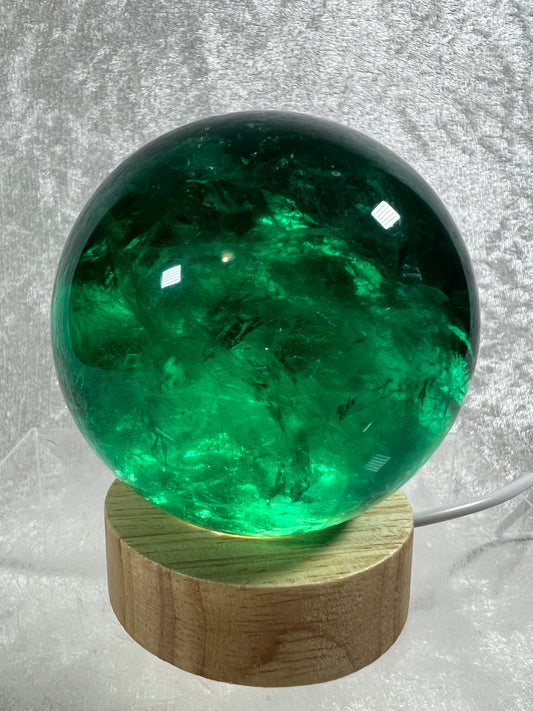 Green Fluorite Sphere. 76mm. Rare Emerald Green Fluorite. Comes With A White Light Stand. Gorgeous High Quality Crystal