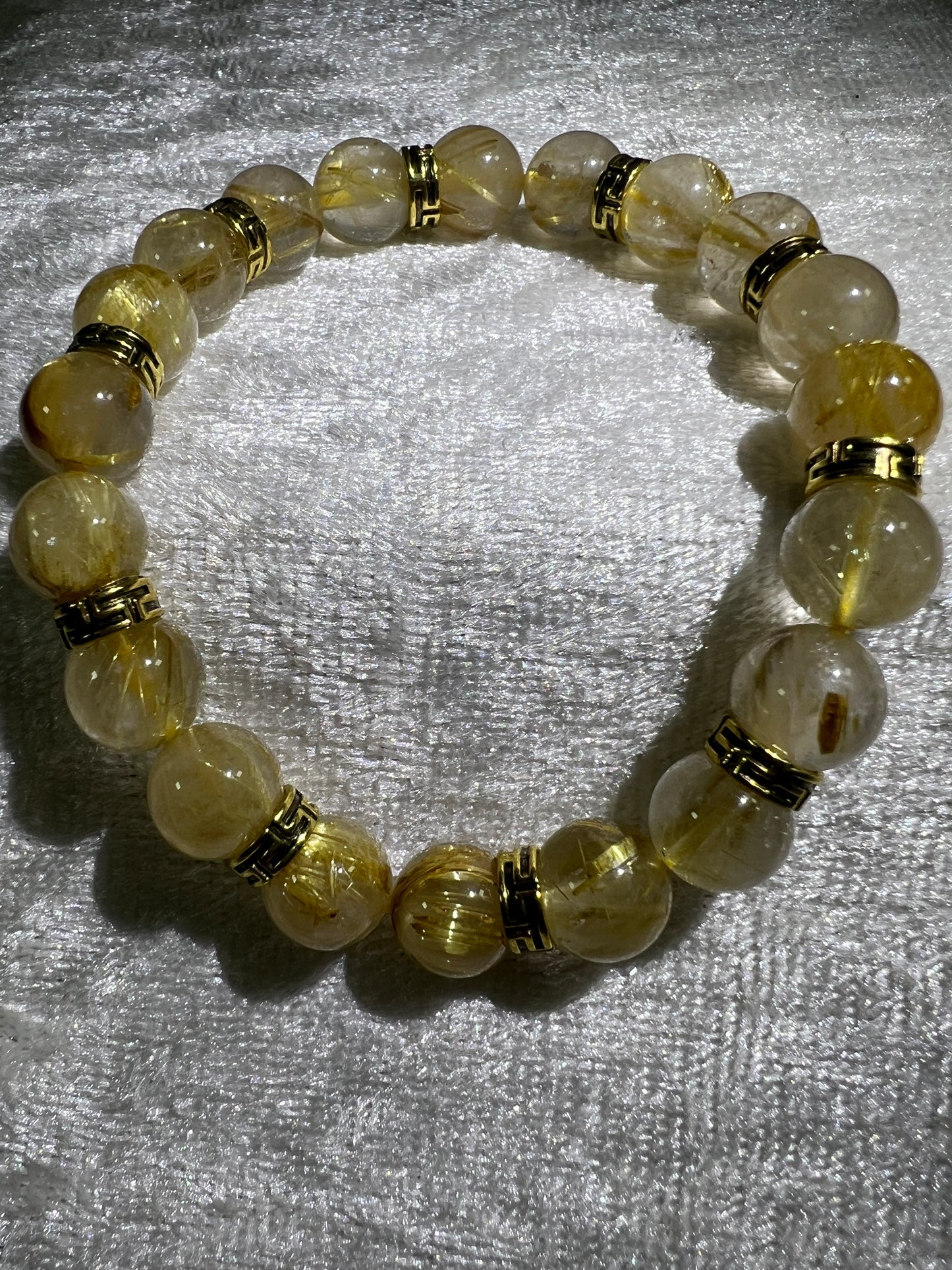 Rutile Quartz Crystal Bead Bracelet. Beautiful Rutilated Quartz Bracelet. 9.5mm. Amazing Golden Spacers.