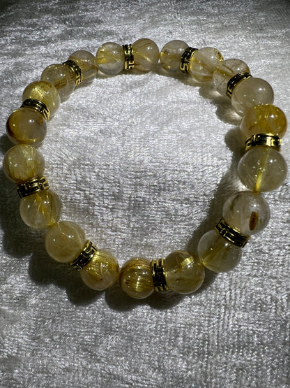 Rutile Quartz Crystal Bead Bracelet. Beautiful Rutilated Quartz Bracelet. 9.5mm. Amazing Golden Spacers.