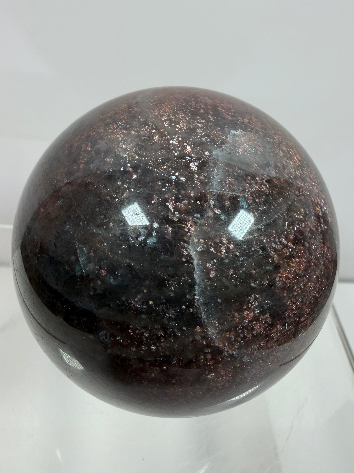 Bloodshot Iolite Sphere. 64mm. Stunning Galaxy Iolite Sunstone Display Sphere. Amazing And Colorful Flash!
