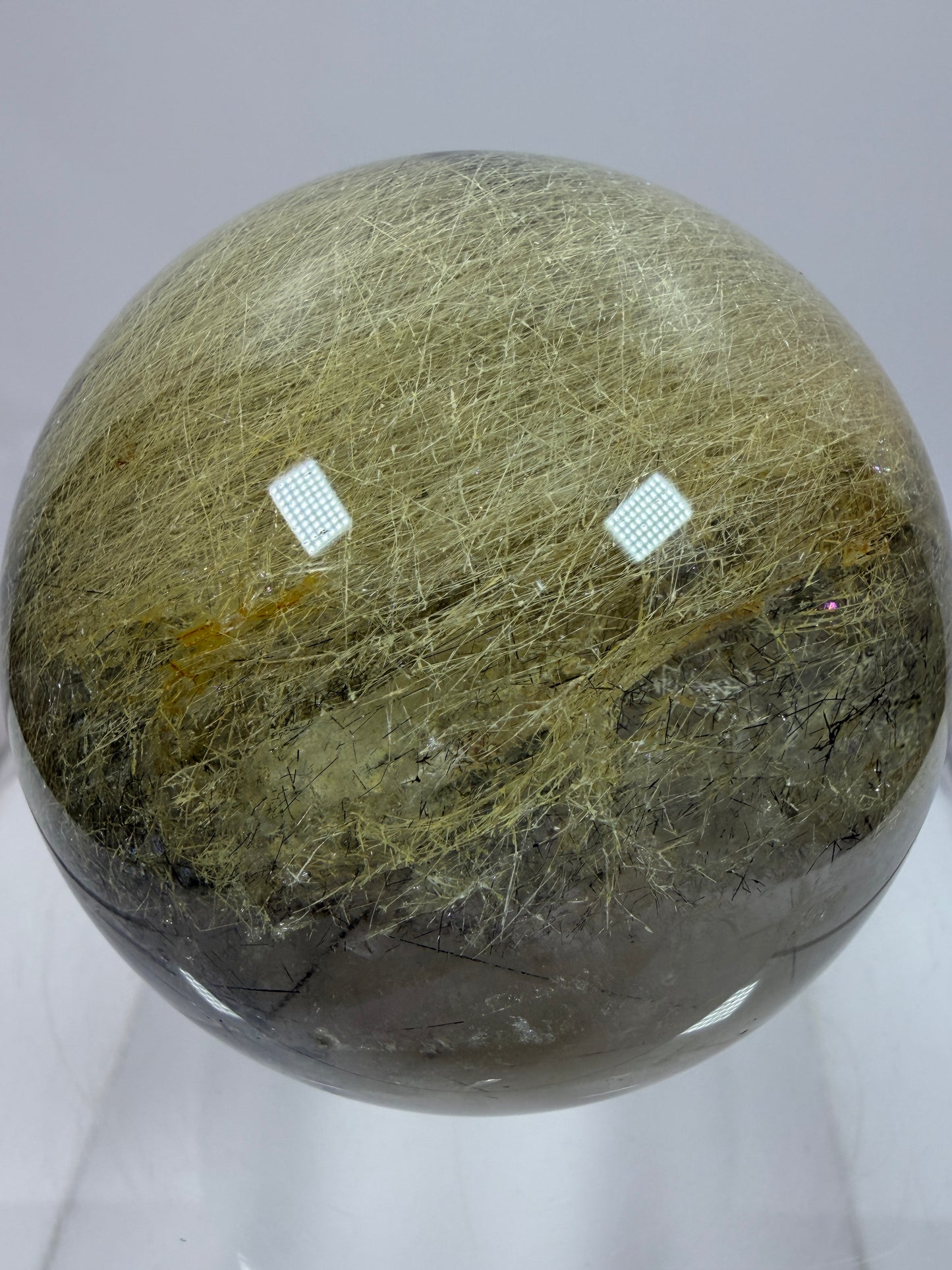 Black Tourmaline And Rabbit Hair Quartz Sphere. 70mm. Stunning Rabbit Hair Rutile With Black Tourmaline Inclusions. Very Rare Display Sphere.