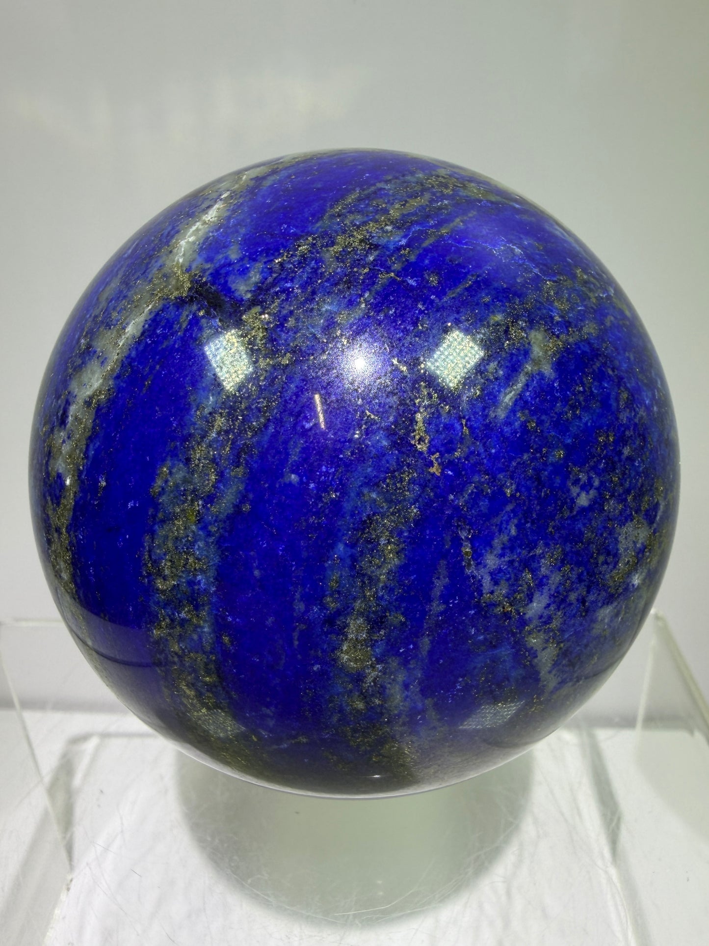 Lapis Lazuli Crystal Sphere. 74mm. Very High Quality Sphere. Stunning Shades Of Bright Blue With Gorgeous Pyrite Inclusions.