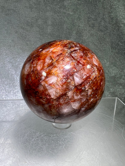 Fire Quartz Sphere. 63mm. Gorgeous Flash And Crystallization. High Quality Hematoid Crystal From Madagascar.