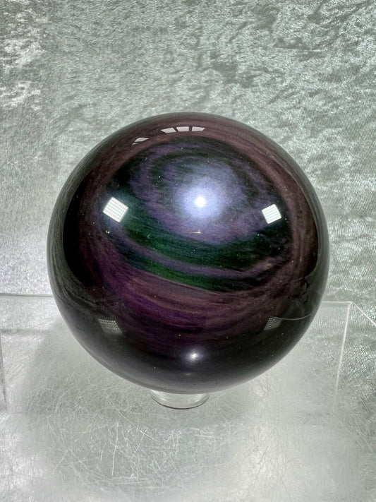 Rainbow Obsidian Sphere. 66mm. Beautiful Purple And Green Rainbow Flash. Rare And Stunning Display Sphere
