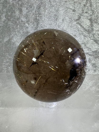 Rutile Quartz Sphere. 58mm. Gorgeous Smoky Quartz With Stunning Golden Rutile Inclusions.