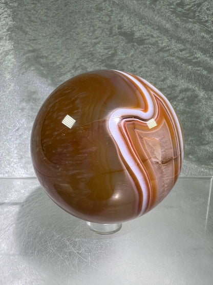 Carnelian Agate Sphere. 63mm. Gorgeous High Quality Display Sphere. Incredible Colors And Banding
