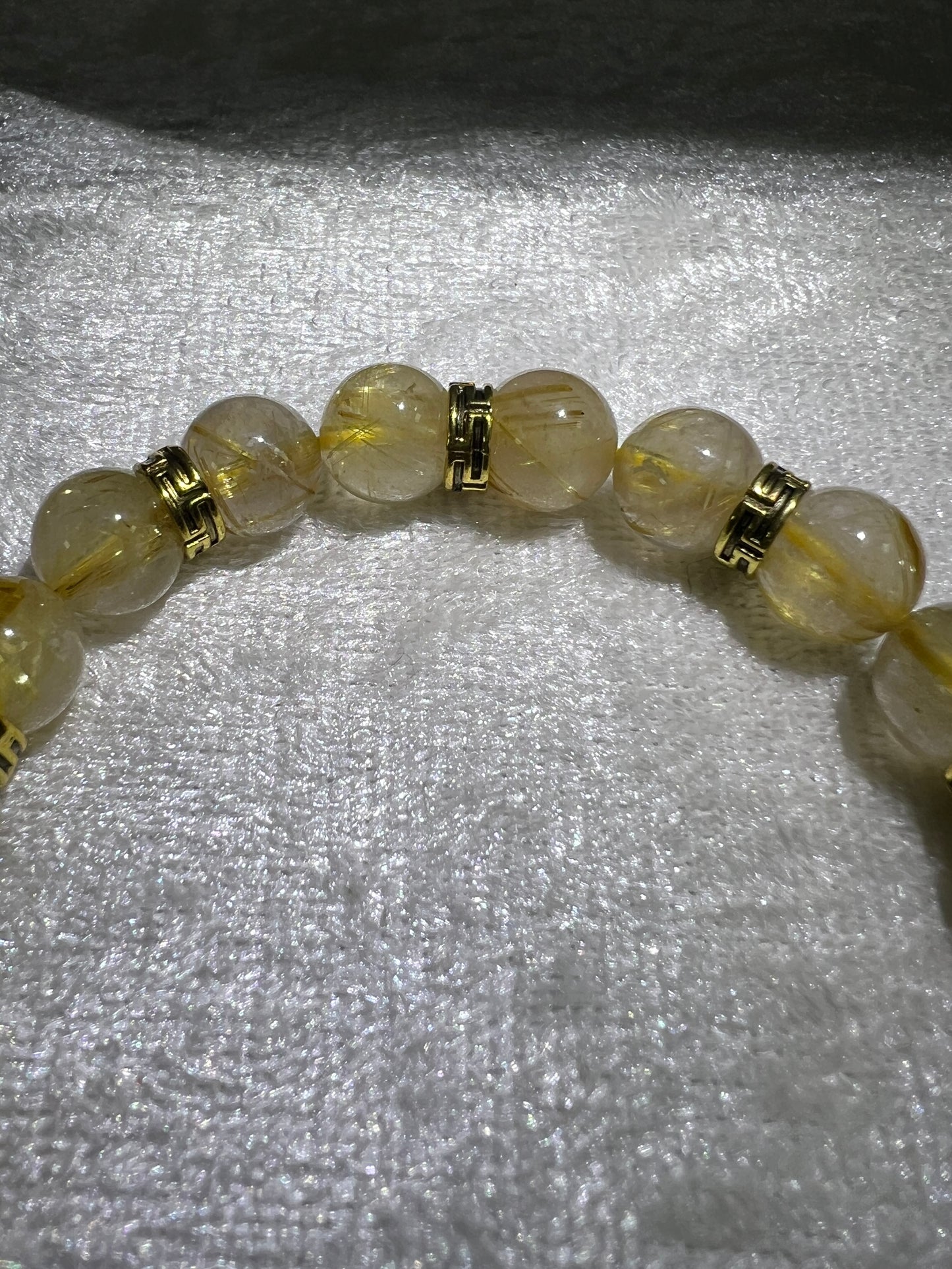 Rutile Quartz Crystal Bead Bracelet. Beautiful Rutilated Quartz Bracelet. 9.5mm. Amazing Golden Spacers.