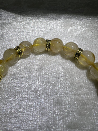 Rutile Quartz Crystal Bead Bracelet. Beautiful Rutilated Quartz Bracelet. 9.5mm. Amazing Golden Spacers.