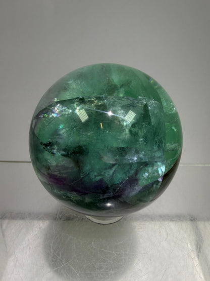 Green And Purple Fluorite Sphere. High Quality Display Sphere With Stunning Rainbows.