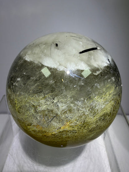 Black Tourmaline And Rabbit Hair Quartz Sphere. 70mm. Stunning Rabbit Hair Rutile With Black Tourmaline Inclusions. Very Rare Display Sphere.