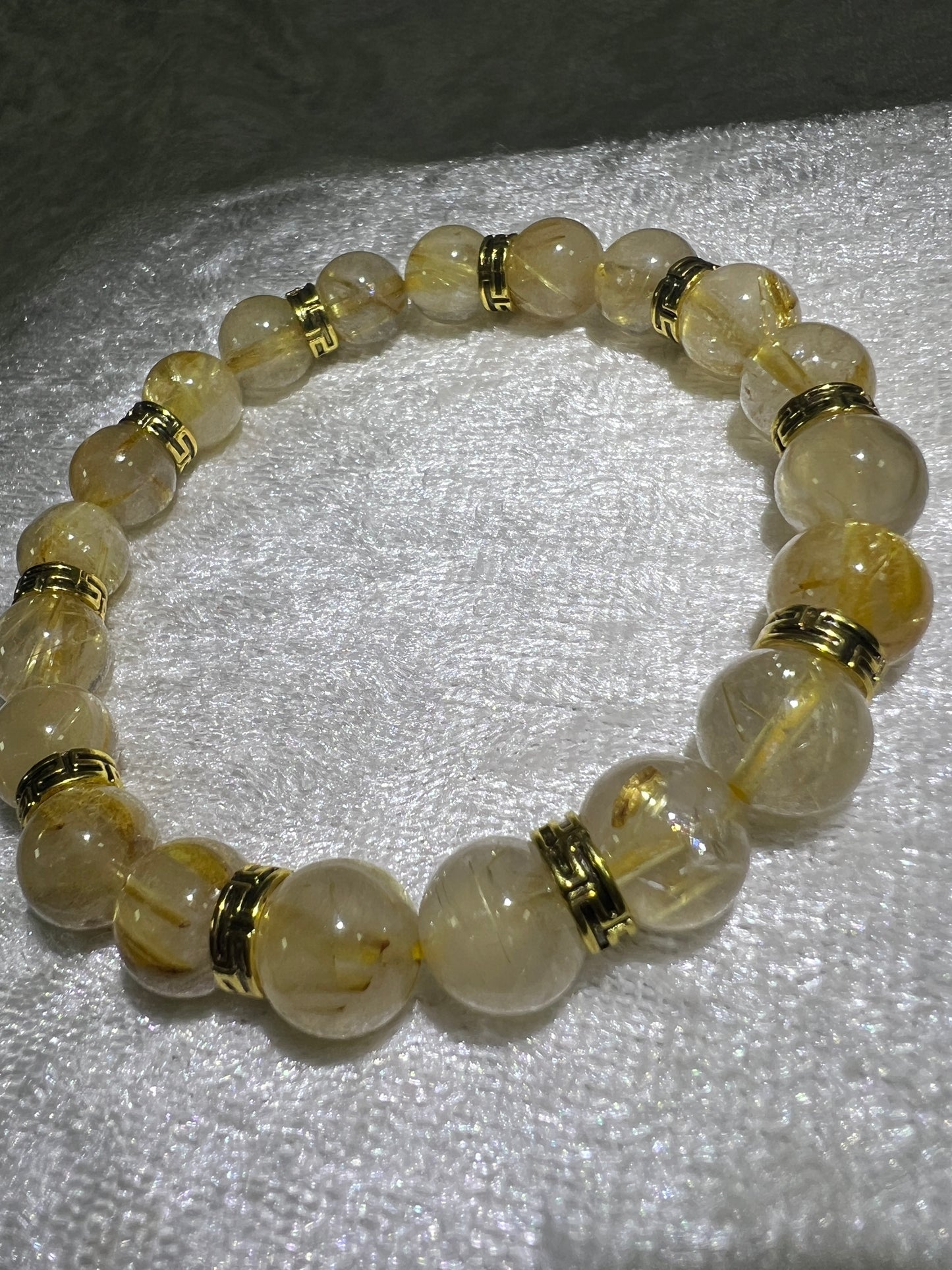 Rutile Quartz Crystal Bead Bracelet. Beautiful Rutilated Quartz Bracelet. 9.5mm. Amazing Golden Spacers.
