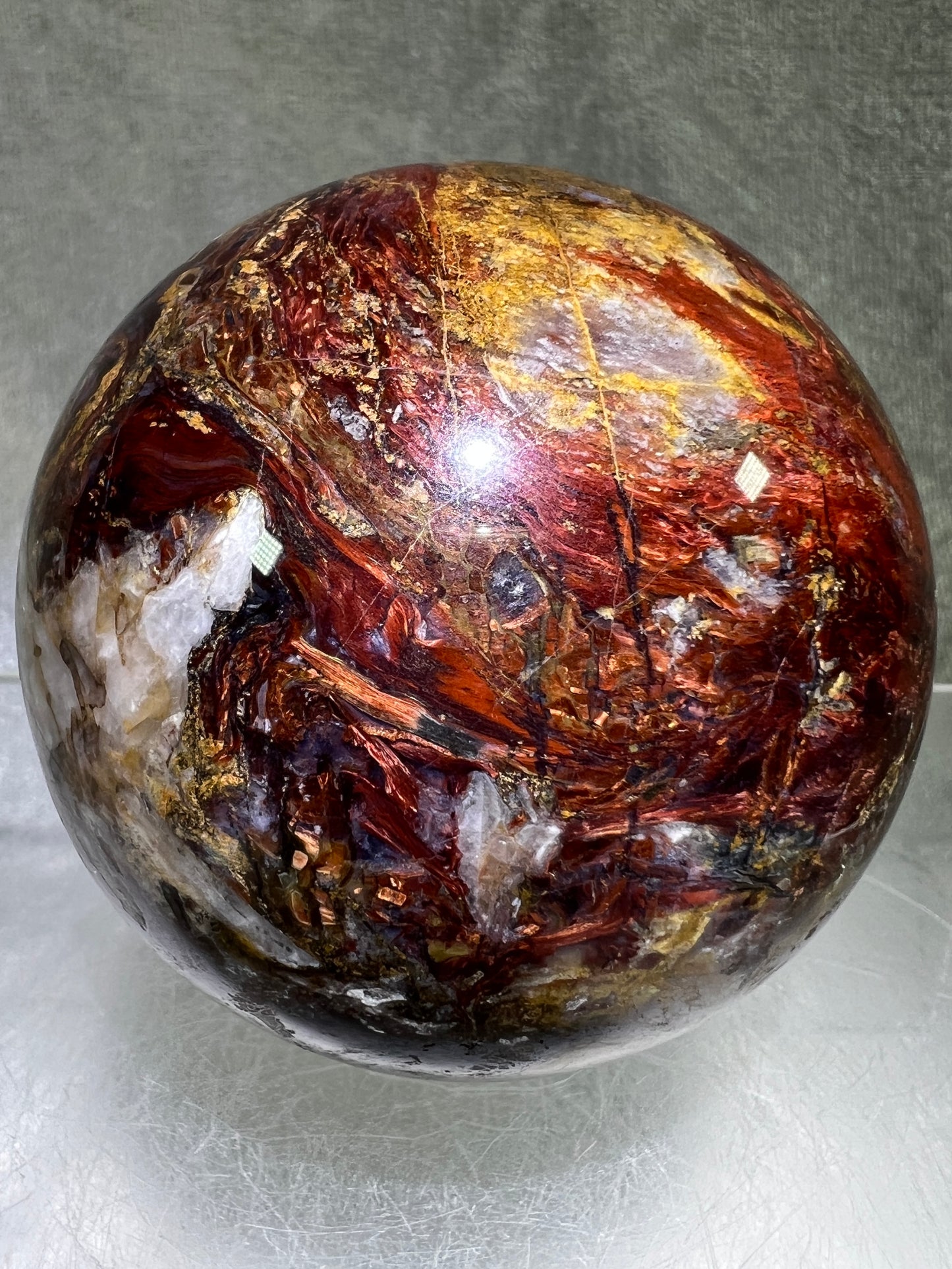Pietersite Crystal Sphere. 66mm. Gorgeous Rare Red Pietersite Crystal. High Quality Display Sphere With Amazing Flash.
